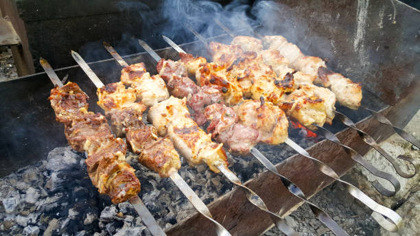 istock to prepare a delicious kebab on vacation 816686900