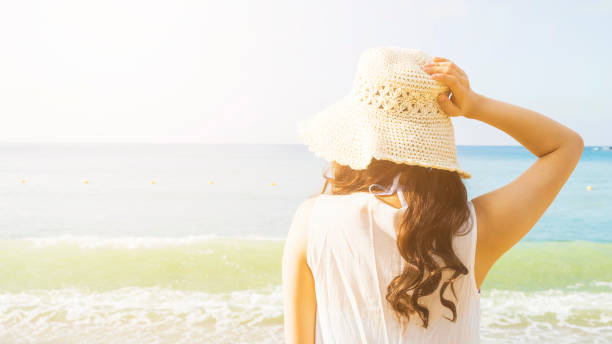 istock beautiful young woman enjoy summer vacation 816689704