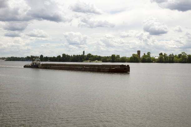 istock The old barge is floating on the river 816692230