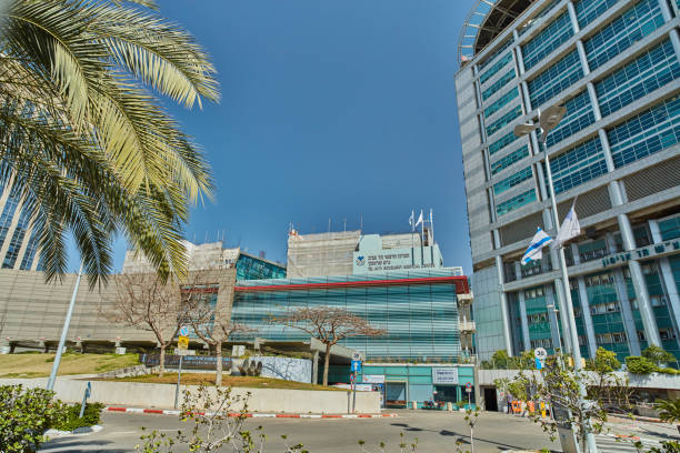 Ihilov medical center in Tel Aviv, building exterior Tel Aviv - 10.02.2017: Ihilov medical center in Tel Aviv, street view to the building exterior, day time ambulance in israel stock pictures, royalty-free photos & images