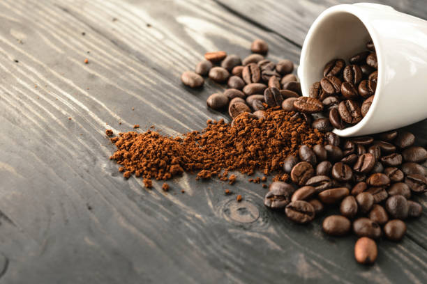 istock morning coffee bean and cup top on wood 816715946