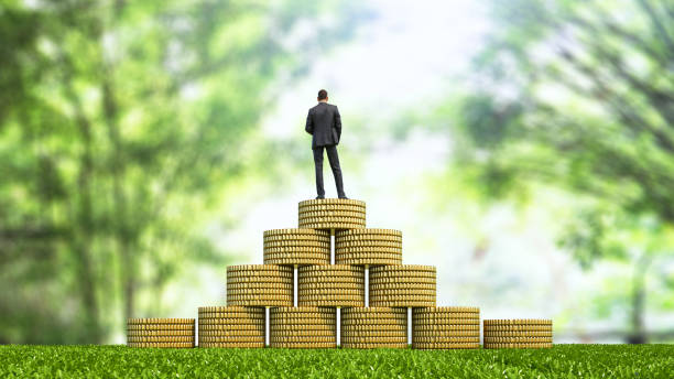 istock Businessman standing on a stack of coins 816716000