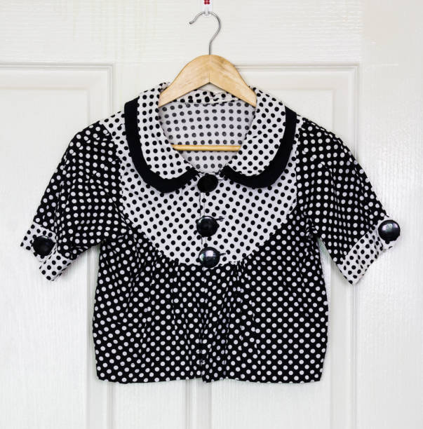 istock Fashion shirt on hanger on a wall 816725912