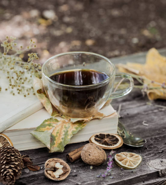 istock cup of tea with autumn leaves 816726068