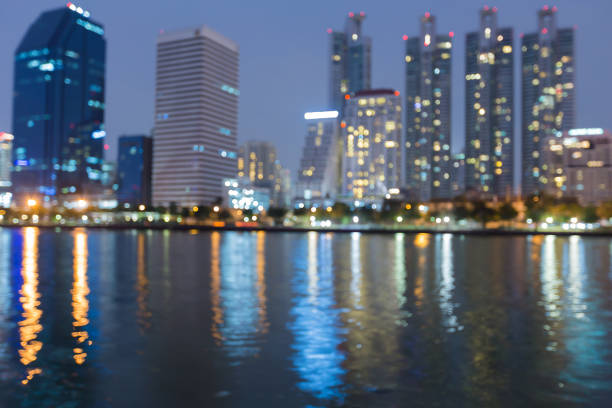 istock Night twilight blurred bokeh office builidng waterfront 816746592