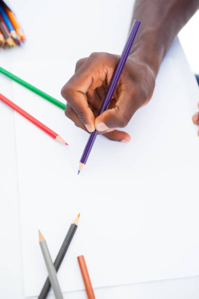 istock Man colouring with purple pencil 816762310