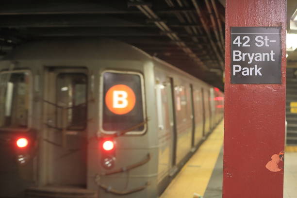 B train at 42nd Bryant Park station, NYC Metro stock photo