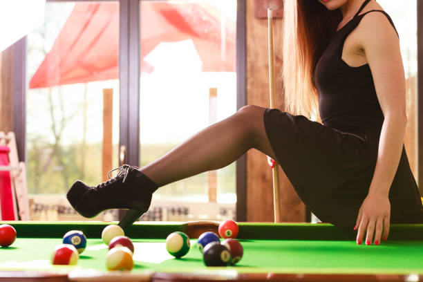 istock Young woman posing having fun with billiard. 816766216