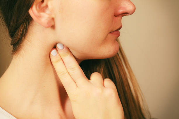 istock Woman checking pulse on neck closeup 816769584