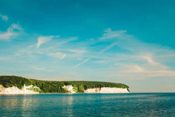 Sassnitz. The famous chalk cliffs shoreline of Jasmund National Park ruegen island germany, view from yacht boat