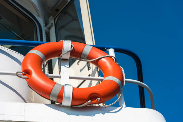 istock Orange lifebuoy on a white yacht 816780392