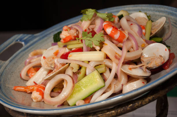 istock Thai spicy and sour seafood salad 816780902
