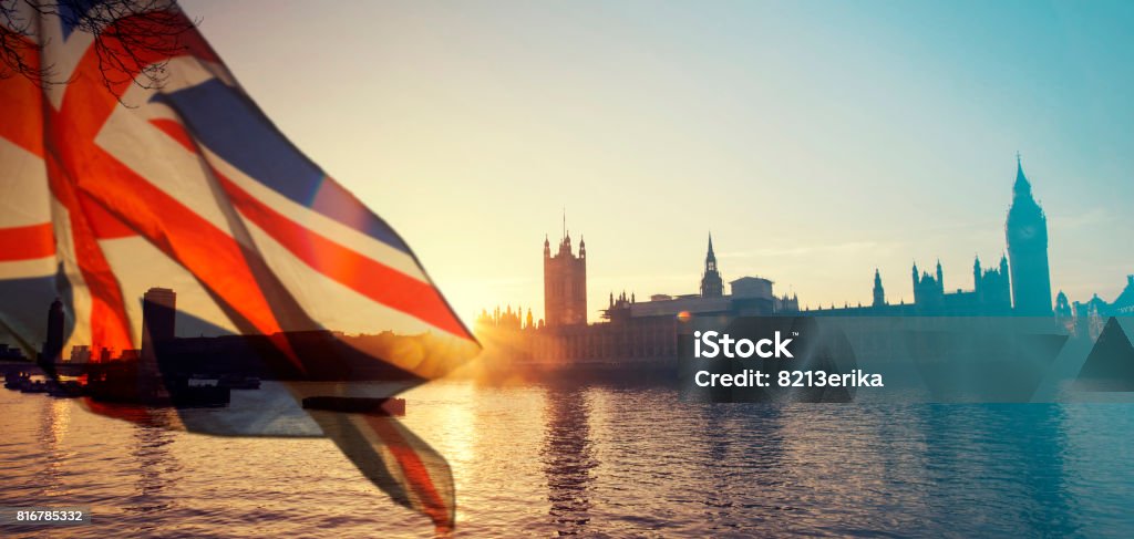 UK flag and Big Ben British union jack flag and Big Ben Clock Tower and Parliament house at city of Westminster in the background - UK votes to leave the EU, Brexit concept UK Stock Photo