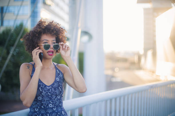 istock Talking on the phone outdoors 816786102
