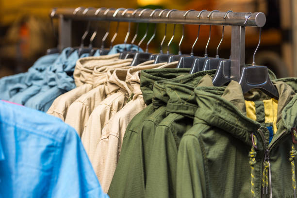 istock Autumn jackets hanging at a store 816786510