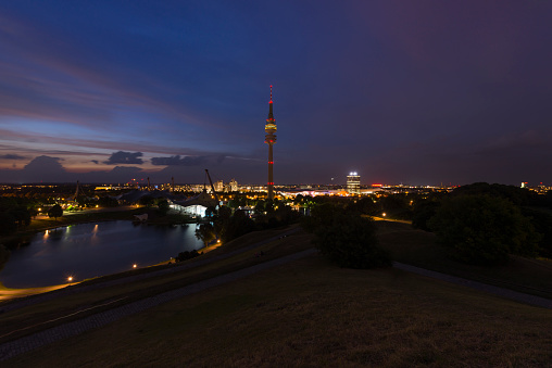 Panoramic view over the Olymic park (Olympiapark München) in Munich at sunset, Germany