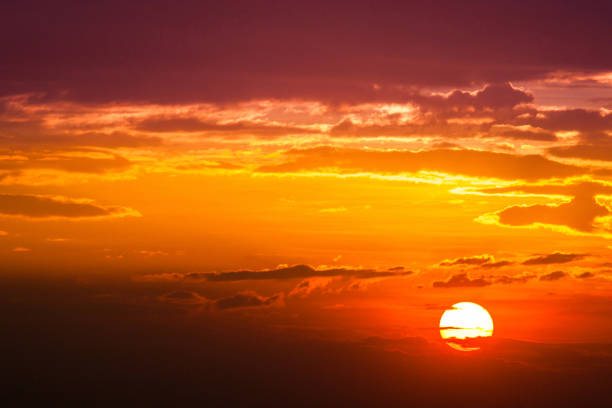 istock sun ray is go down and amazing dramatic  orange cloud, twilight sky 816794788