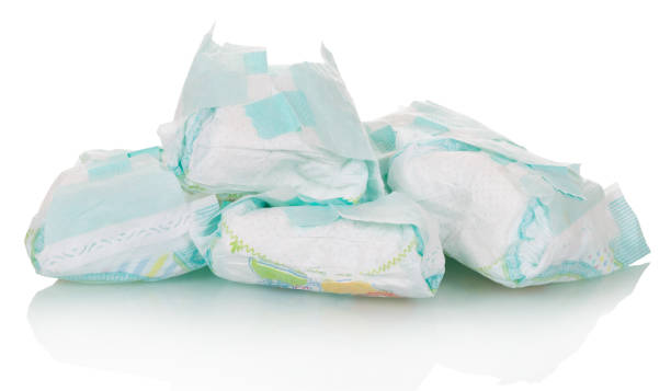 istock A few used disposable diapers are isolated on white background. 816818510