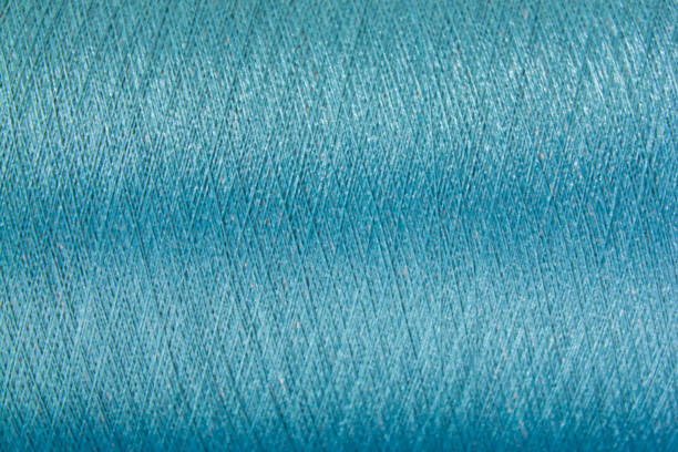 istock Closed up of blue color thread texture background 816822742