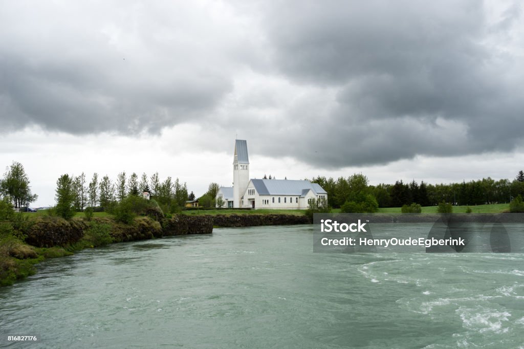 Selfosskirkja next to the Olfusa river in Selfoss, Iceland Selfosskirkja on the banks of the Olfusa river in Selfoss, Iceland Iceland Stock Photo