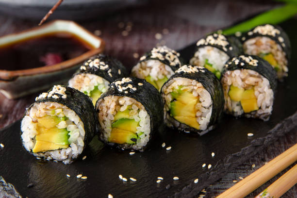 istock Maki rolls with avocado and unagi sauce. Sushi menu. 816830552