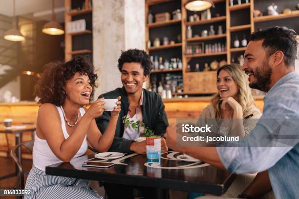 Young Friends Having A Great Time In Cafe Stock Photo - Download Image Now - Friendship, Coffee - Drink, Cafe
