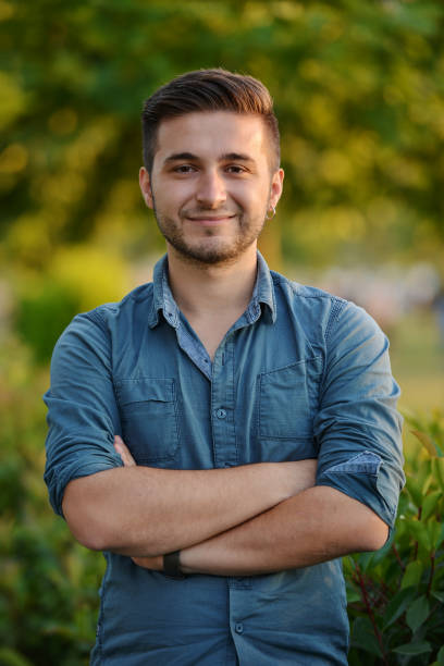 istock Portrait of smiling young man 816833648