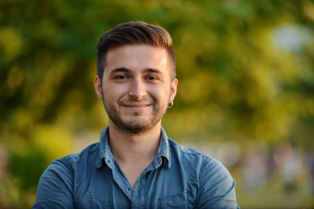istock Portrait of smiling young man 816838000
