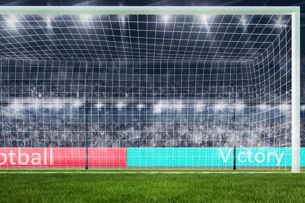 istock football goal with people on background close-up 3d rendering 816843826