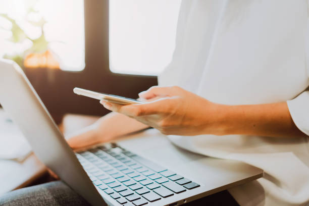 istock Women using a laptop in the display and technology advances in stores. Take your screen to put on advertising. 816843996