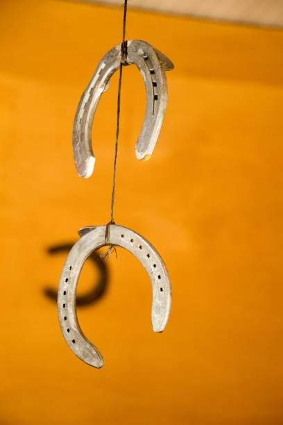 istock Lucky horseshoes with nail holes 816852954