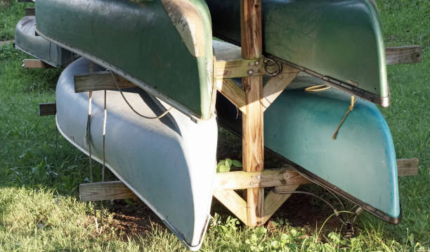 istock Canoes in dry dock storage 816855860