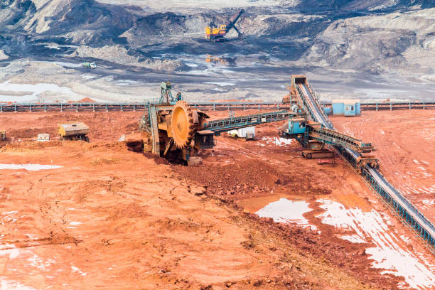 istock Part of a pit with big mining truck working 816858484