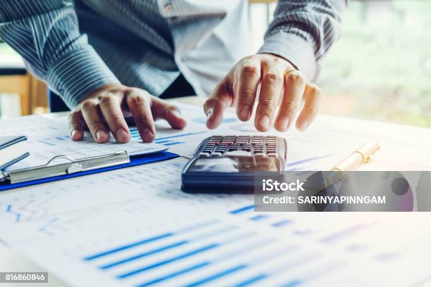 Business Man Accounting Calculating Cost Economic Stock Photo - Download Image Now - Financial Loan, Business, Home Finances