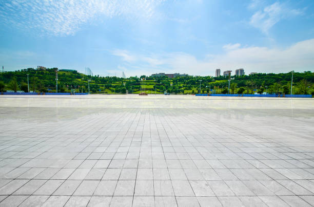 long empty footpath in modern city square with skyline long empty footpath in modern city square with skyline cobo hall photos stock pictures, royalty-free photos & images