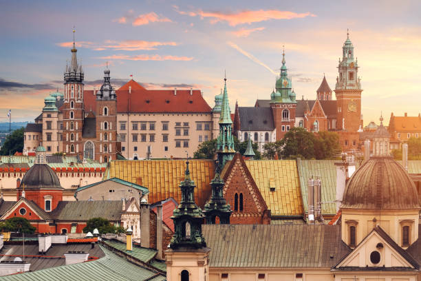 Collage of Krakow landmarks in the evening Collage of Krakow landmarks in the evening with dramatic sunset. wawel cathedral stock pictures, royalty-free photos & images