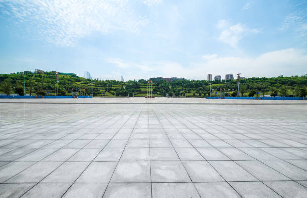 long empty footpath in modern city square with skyline long empty footpath in modern city square with skyline cobo hall photos stock pictures, royalty-free photos & images