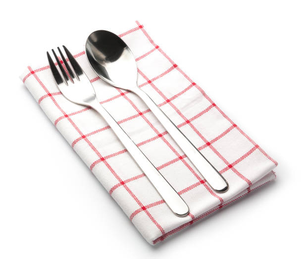 istock fork and knife on red napkin on white background 816876690