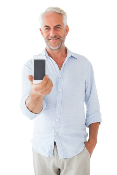 istock Smiling man showing smartphone to camera 816876888