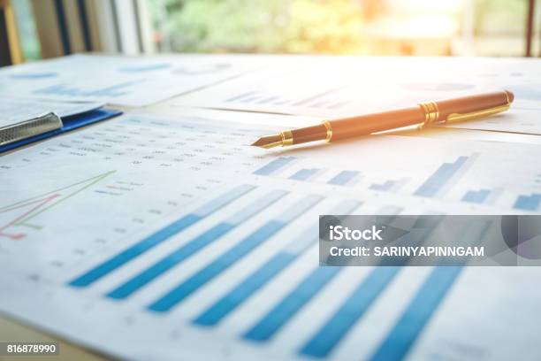 Pen On The Business Paper Report Chart Stock Photo - Download Image Now - Planning, Retirement, Wealth