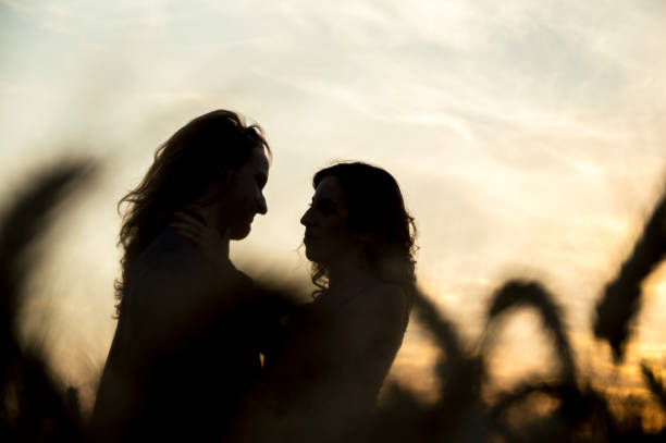 istock Young couple at grain field 816882742