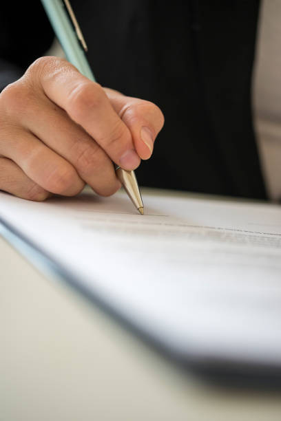 istock Woman signing contract 816898608