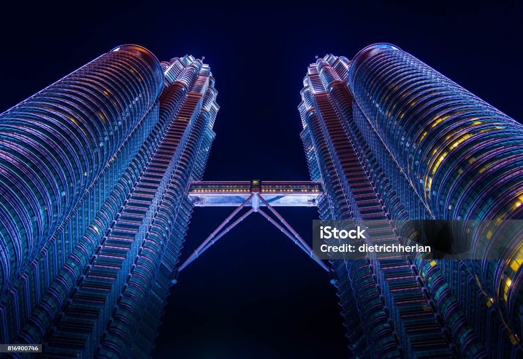 Kuala Lumpur at night Petronas Twins Towers - Malaysia. Kuala Lumpur, Malaysia - A night in Kuala Lumpur with a background of the tallest twin tower in the world. Architecture Stock Photo