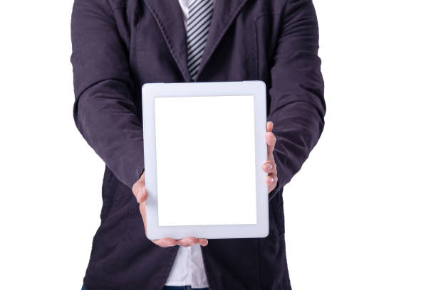 istock businessman in a suit holding a tablet 816901196