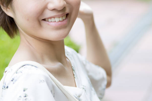 istock woman with a cute smile 816907262