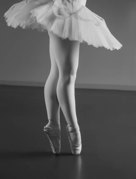 istock Graceful ballerina standing en pointe 816910224
