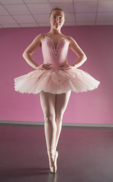 istock Graceful ballerina standing en pointe 816910248