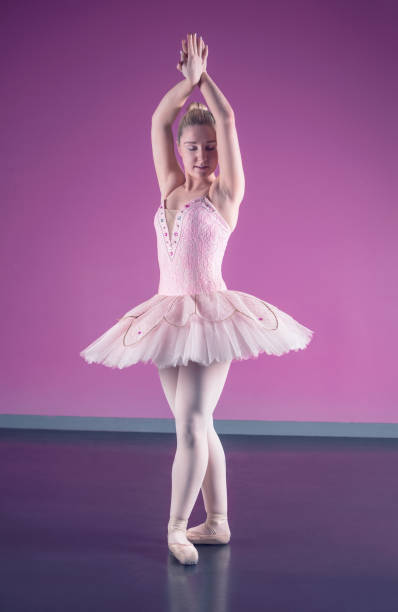 istock Graceful ballerina standing in fifth position 816914766