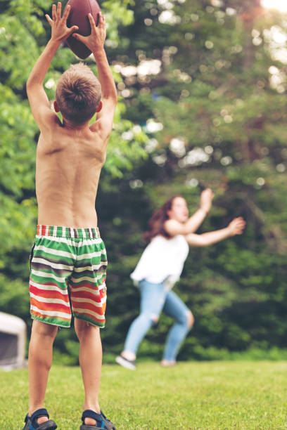 istock Brother and sister playing a game outdoors 816919326