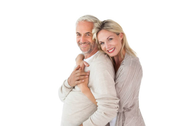 istock Happy couple standing and hugging 816926824